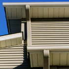 Gutters on the side of a house